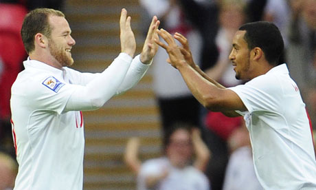England's Wayne Rooney celebrates scoring the opening goal against Andorra with Theo Walcott
